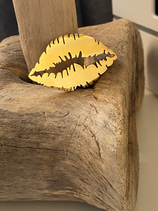 Broche "lèvre" dorée