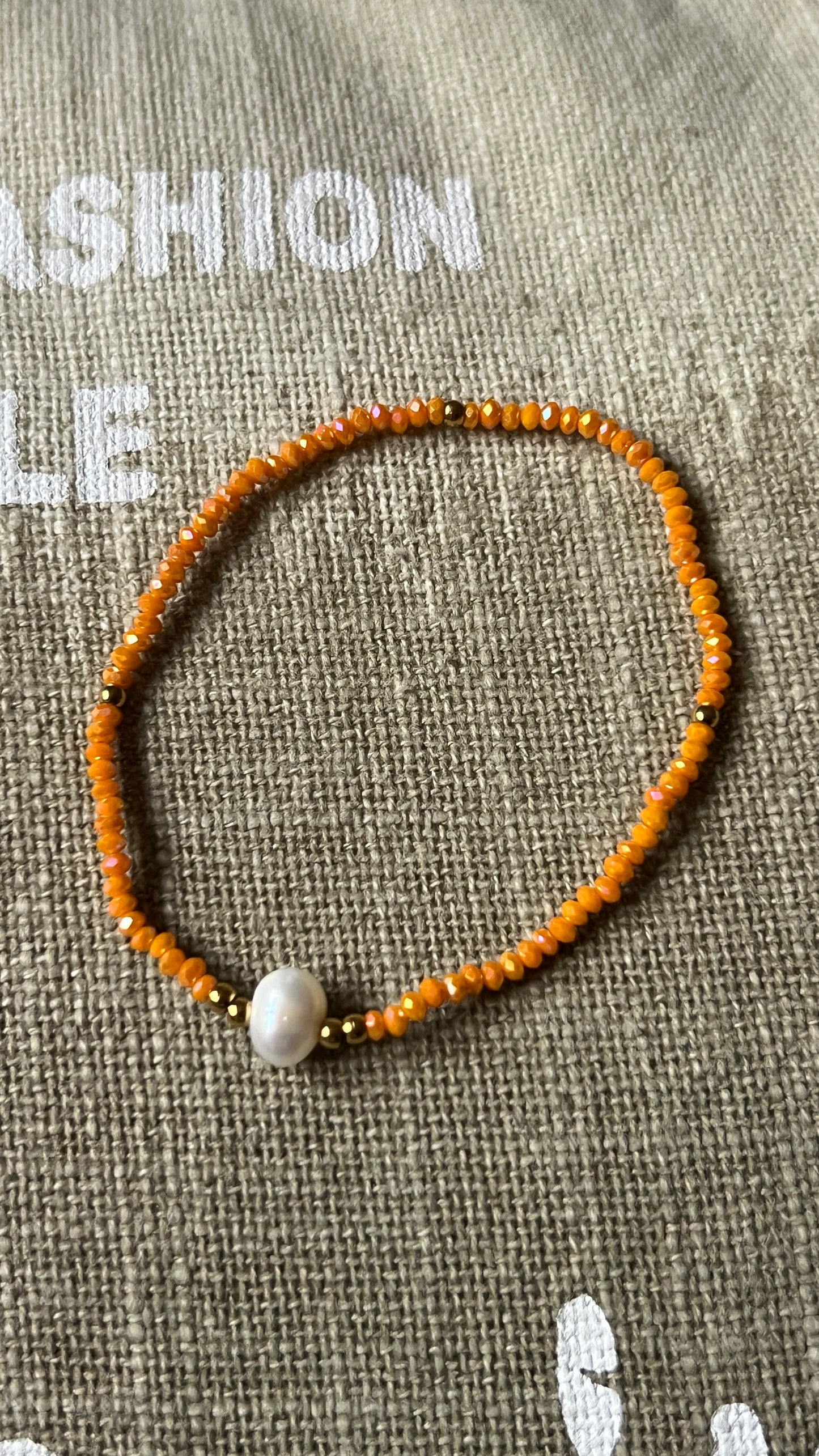 BRACELET ELASTIQUE PERLES ORANGE