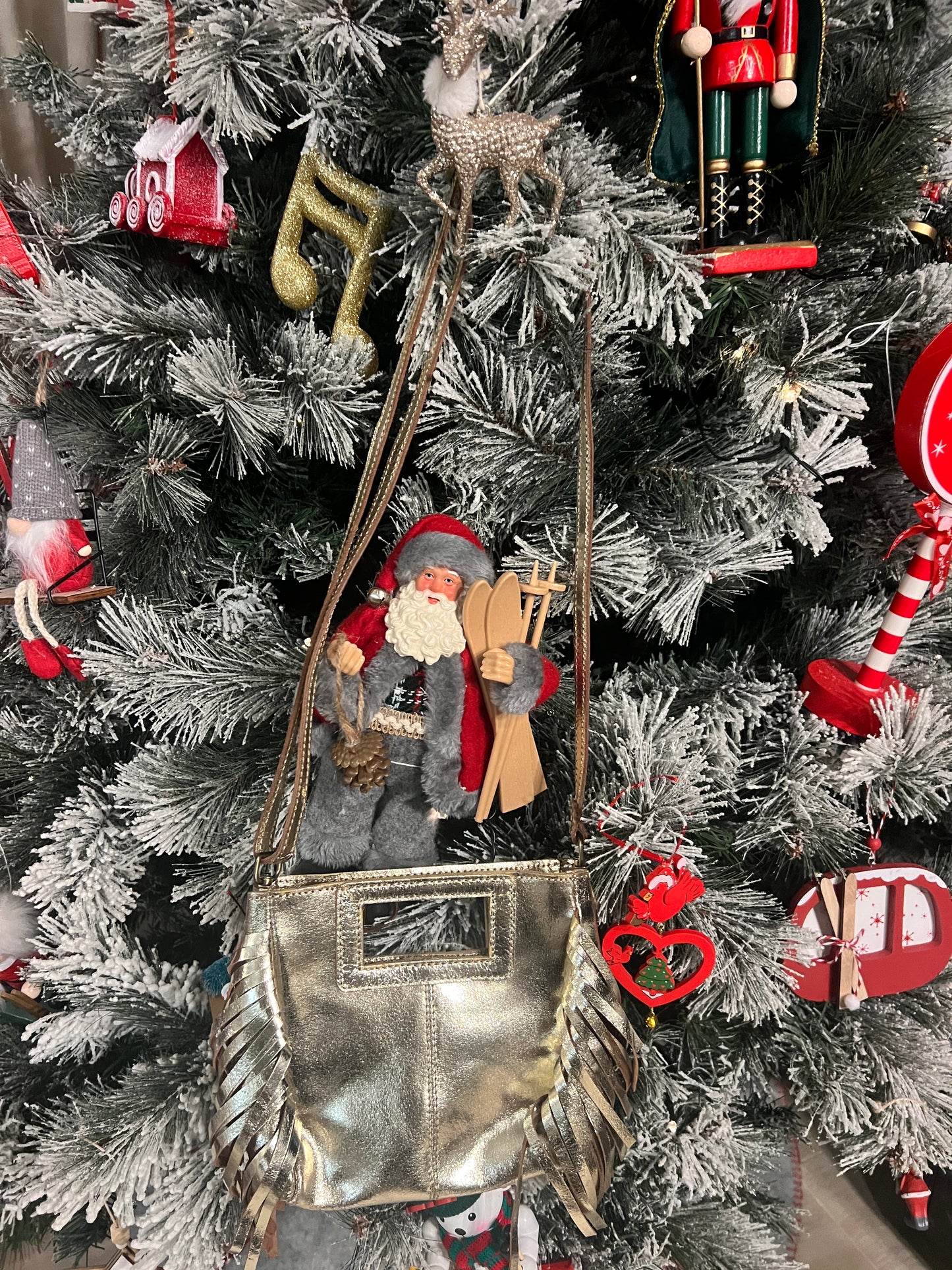 PETIT SAC EN CUIR DORE A FRANGES