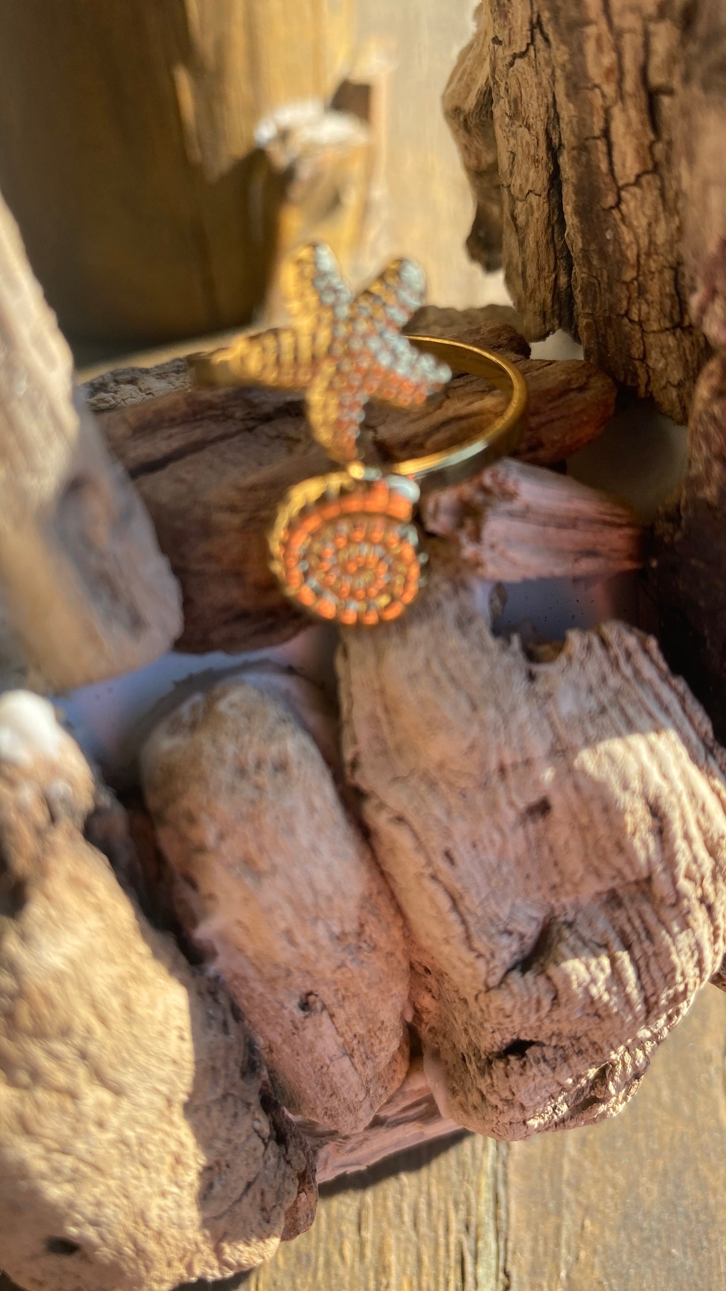 Bague dorée "étoile de mer/escargot