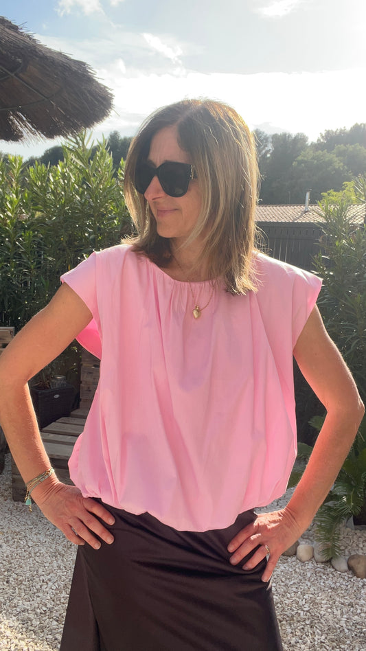 BLOUSE SANS MANCHES  DOS NU