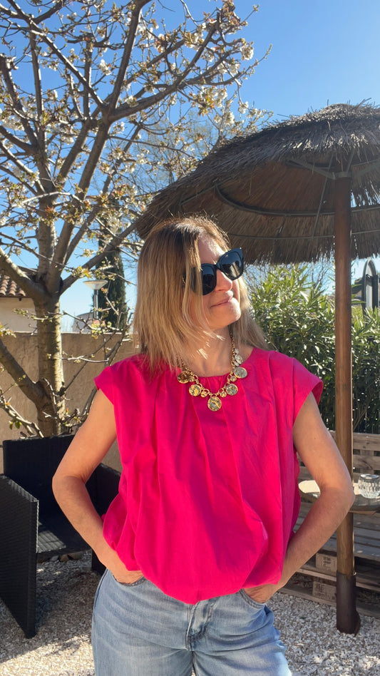BLOUSE SANS MANCHES  DOS NU