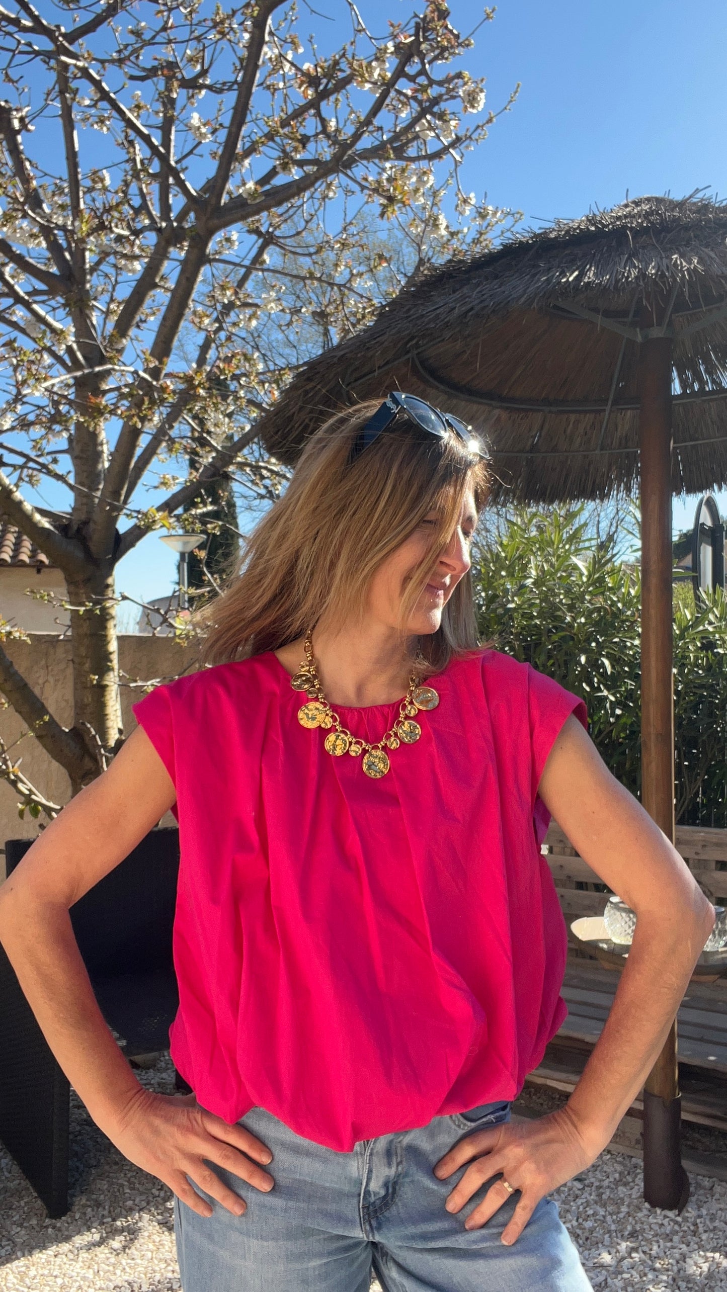 BLOUSE SANS MANCHES  DOS NU
