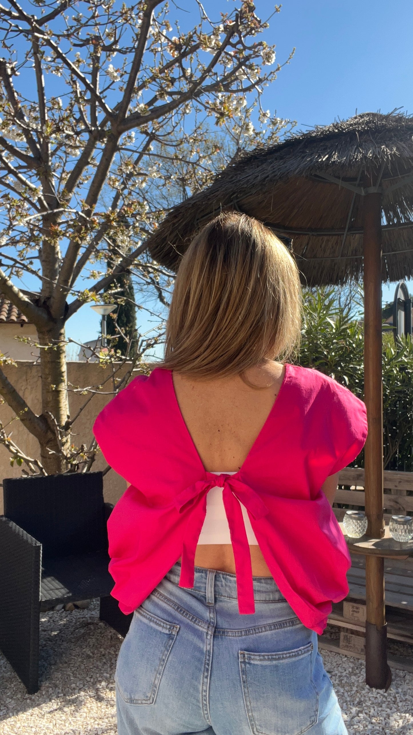 BLOUSE SANS MANCHES  DOS NU